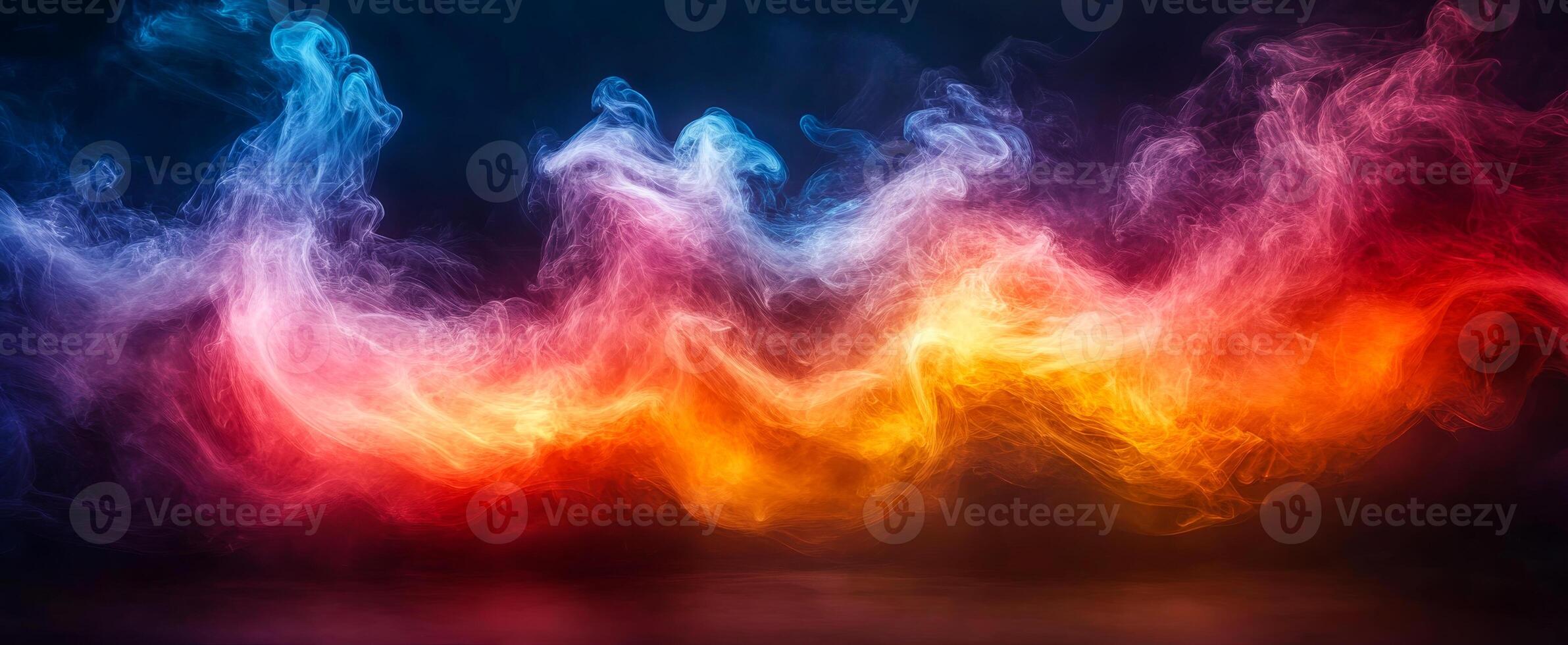 Artistic colorful smoke swirls. Vibrant smoke in red, blue, and yellow hues creates a dynamic abstract display in a dark setting. photo