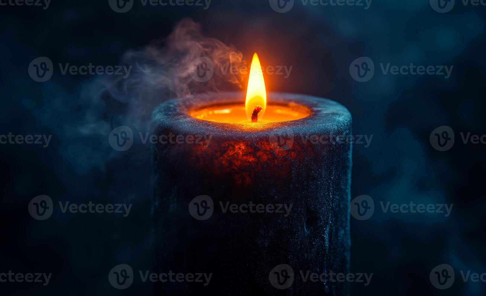 Candlelight in a calm moment. A single candle burns softly, casting warm light and creating a tranquil atmosphere in a dimly lit space. photo