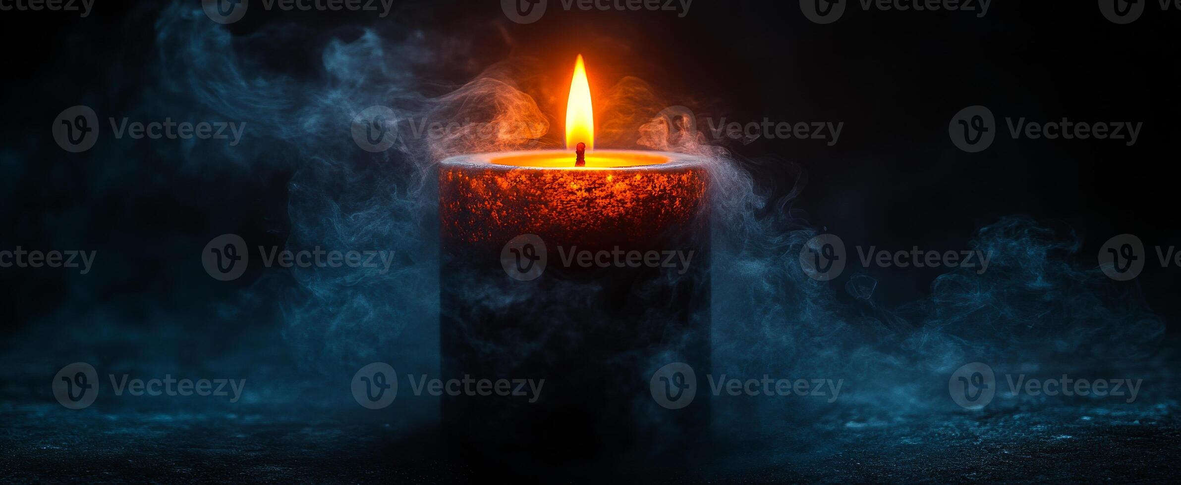 Candle glowing in dark with soft smoke. A round candle emits a warm flame, surrounded by gentle wisps of smoke in a dark environment. photo