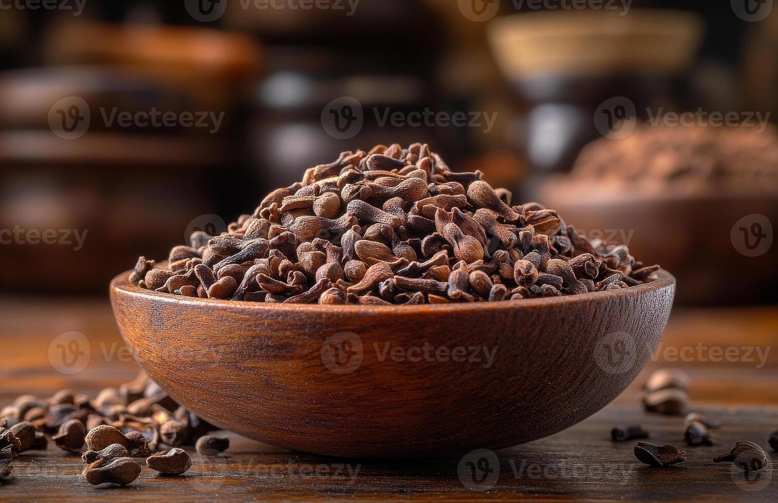 Cacao beans in a bowl. A wooden bowl filled with roasted cacao beans, surrounded by jars in a warm, rustic kitchen atmosphere. photo