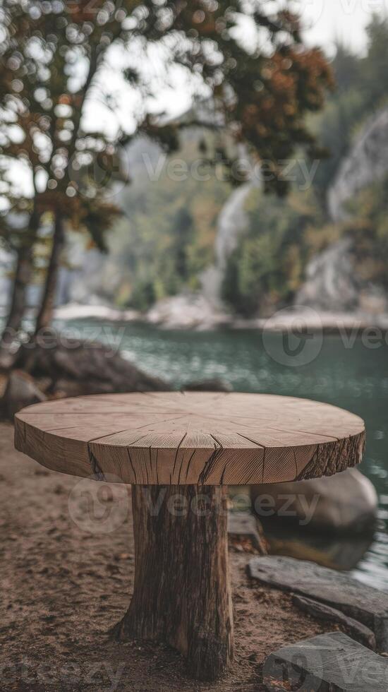 A table sitting on the shore of a lake photo