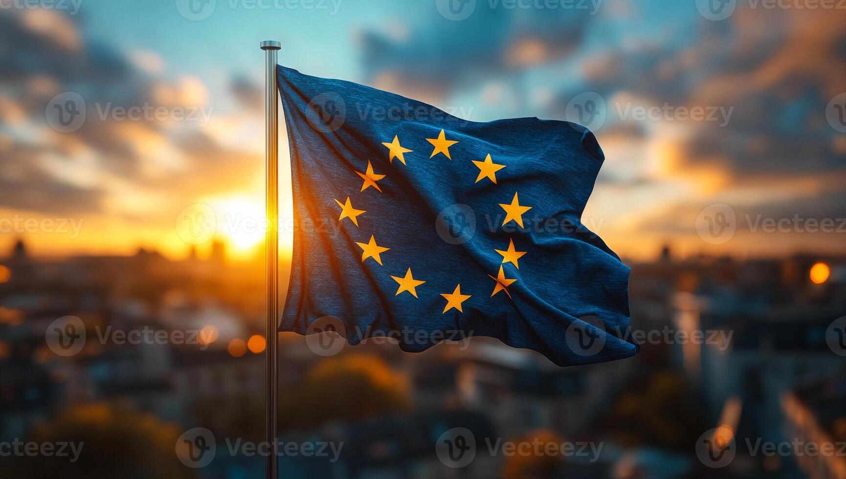 EU flag at sunset over city. A European flag flutters in the breeze during sunset, casting a warm glow over the urban skyline. photo