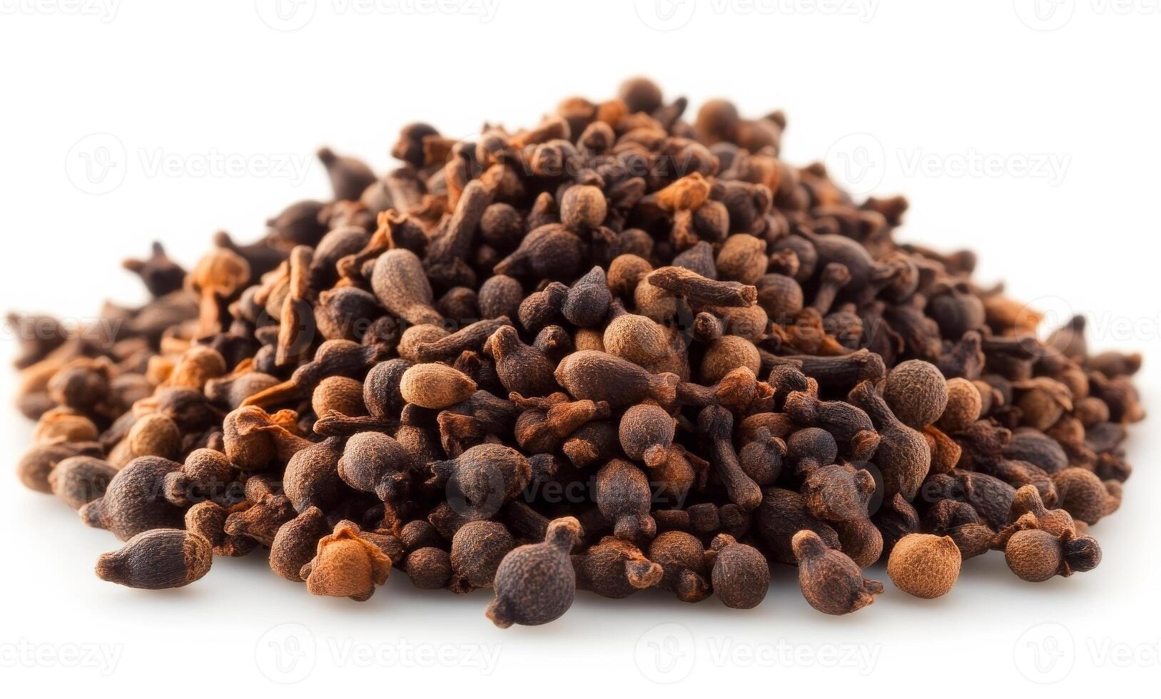 Mound of clove spices on white. A mound of whole cloves stands out against a white background, highlighting their dark color and unique shape. photo
