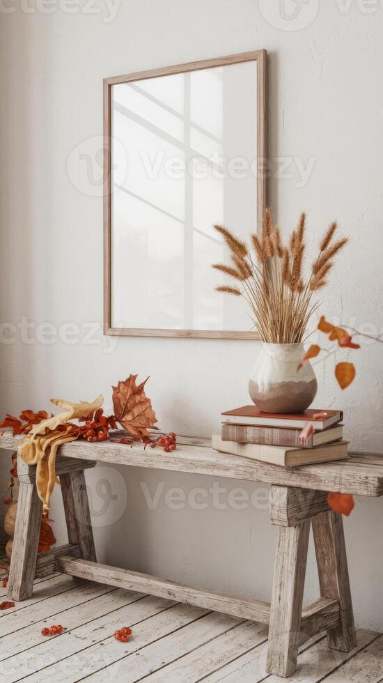 Mockup of a wooden bench with autumn leaves and a picture frame in a white room with photo
