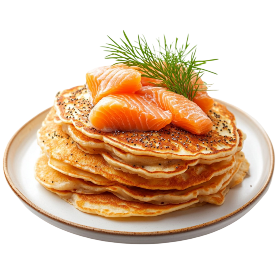 Stack of golden pancakes topped with smoked salmn and dill png