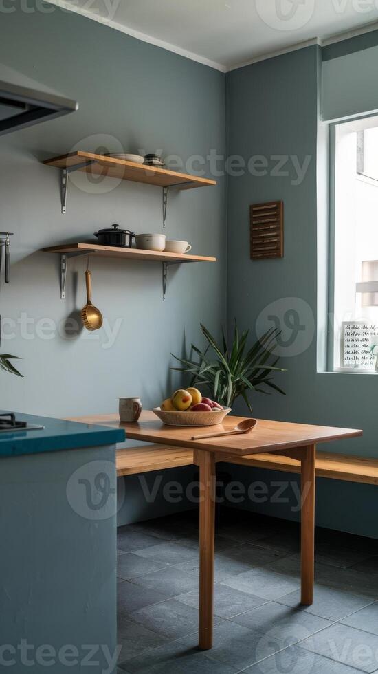 A kitchen with blue walls and wooden benches photo