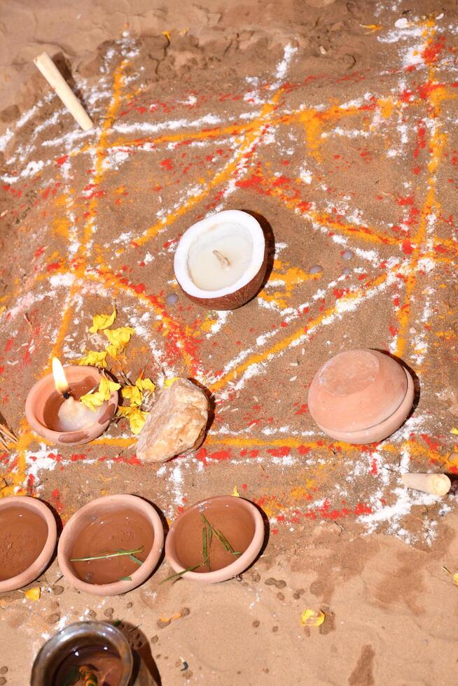 A table with bowls and a flower on it photo