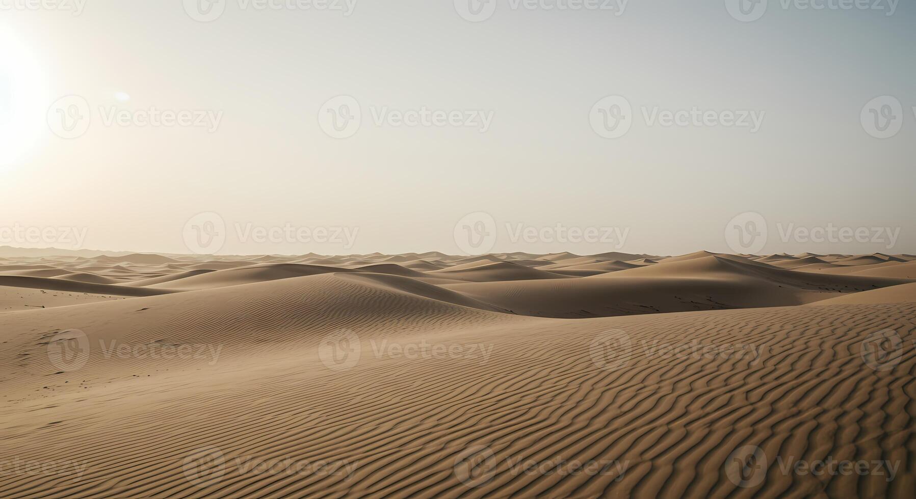 the desert is full of sand dunes and the sun is shining photo
