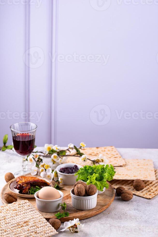 Traditional Passover Seder plate with symbolic foods. Symbolic of Jewish holiday Pesah. photo