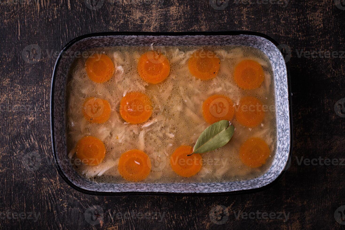 Aspic with chicken meat and carrot photo