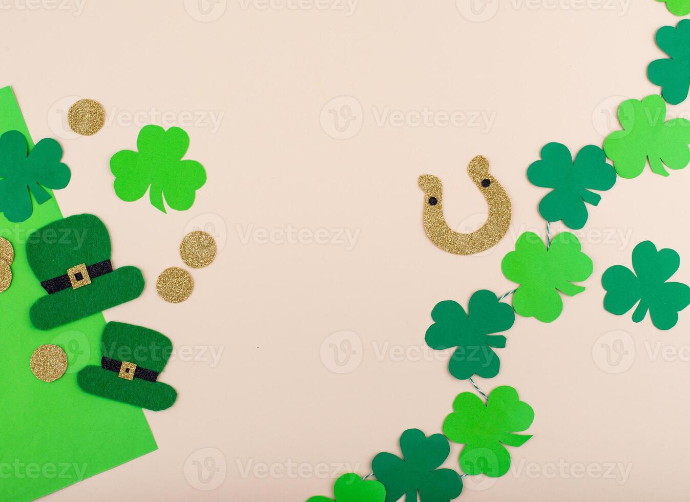 St. Patrick's Day concept with leprechaun hat, gold coins and horseshoe photo