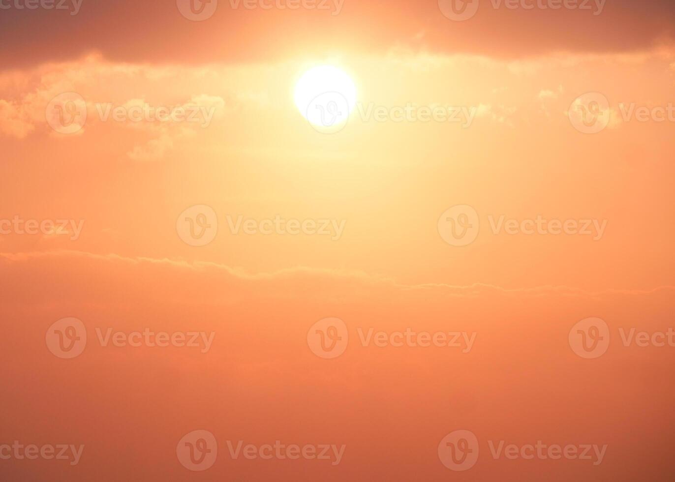 Stunning Sunset with Golden Sky and Clouds Creating a Serene and Tranquil Atmosphere Perfect for Relaxation and Inspiration photo