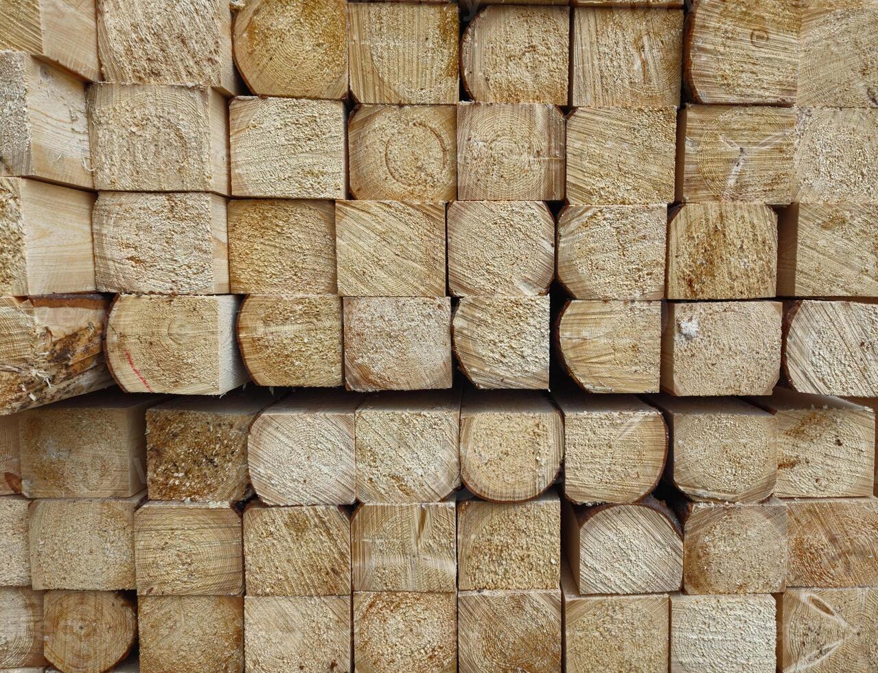 Stack of Wooden Planks in Construction Warehouse for Building Projects photo