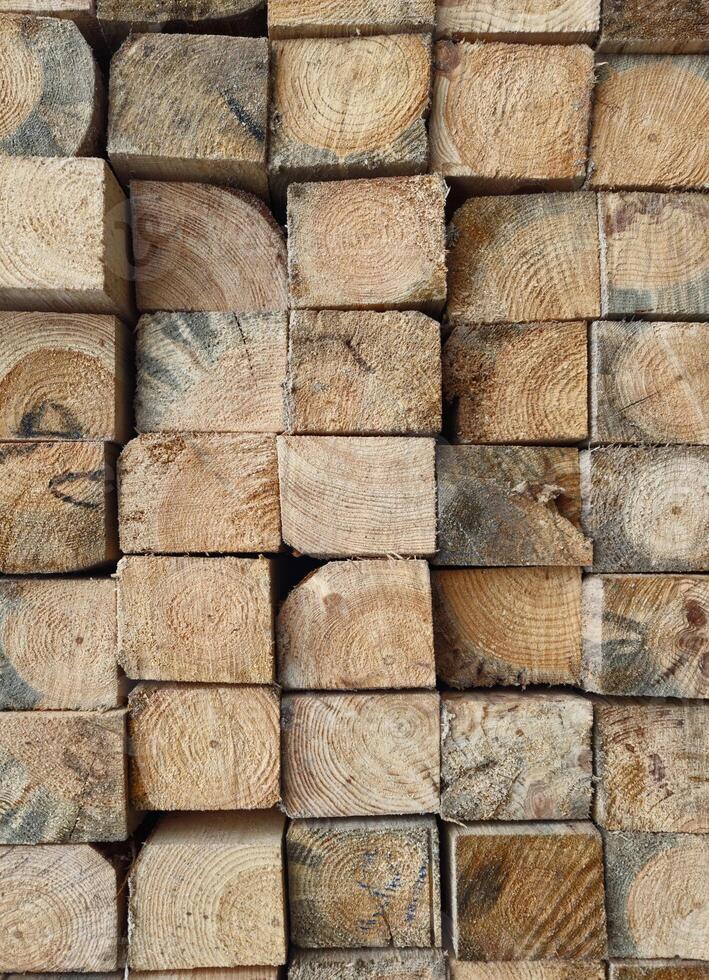 Stack of Wooden Planks in Construction Warehouse for Building Projects photo