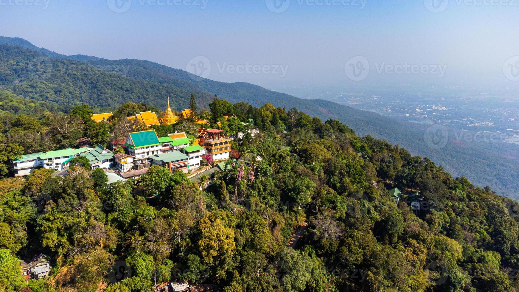 Wat Phra That Doi Suthep Temple shining on the mountainside in Chiang Mai, Thailand photo