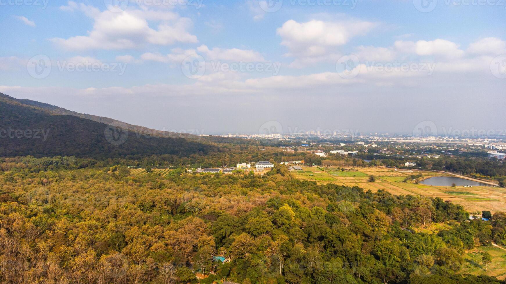 Aerial view of Chiang Mai city with Doi Suthep-Pui National Park in foreground photo