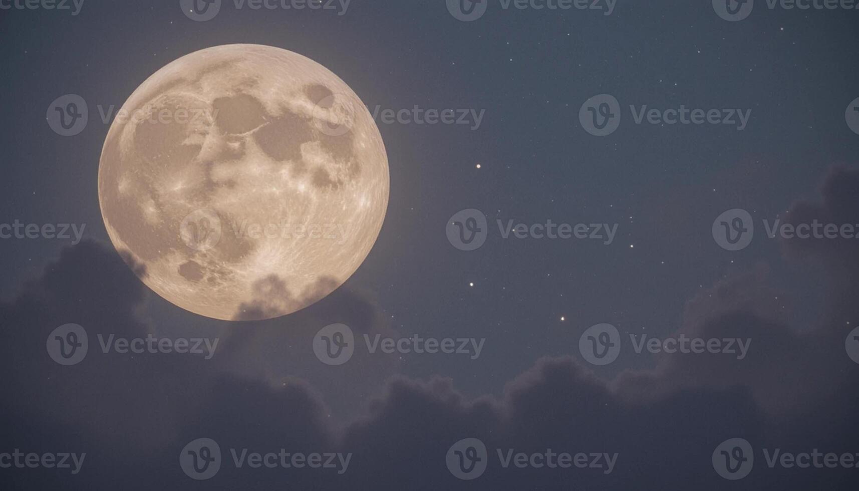 Full moon in the night sky with clouds photo