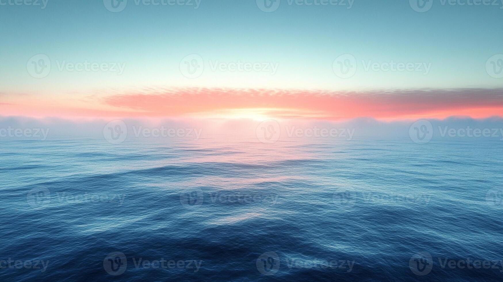 A beautiful sunset over the ocean with clouds photo