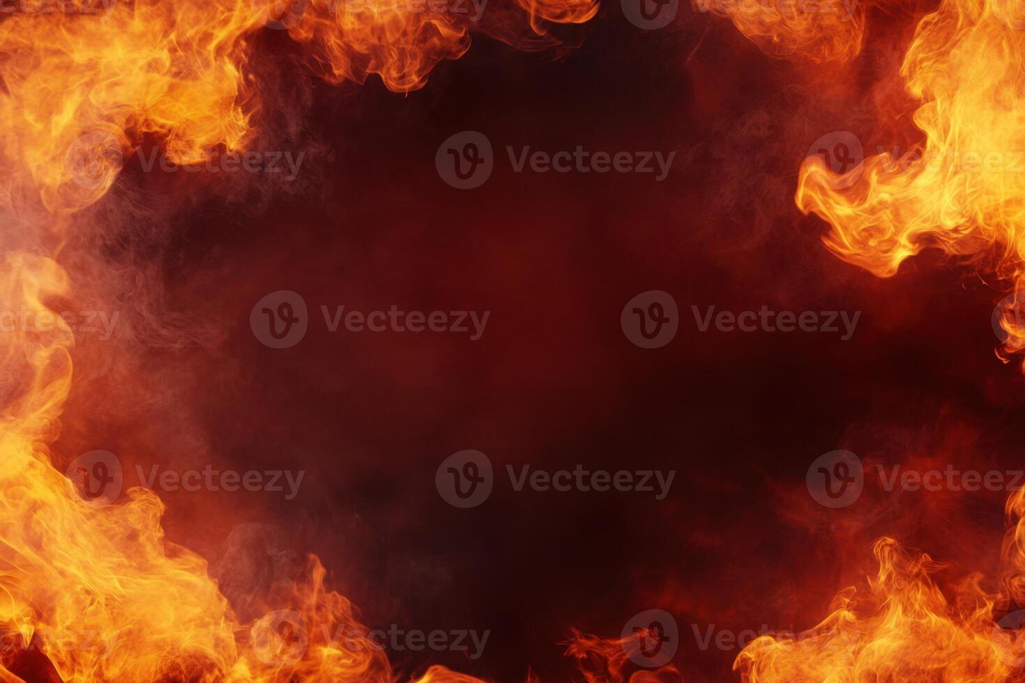 A dynamic display of fiery energy with flames framing a dark, smoky center. Space for your design photo