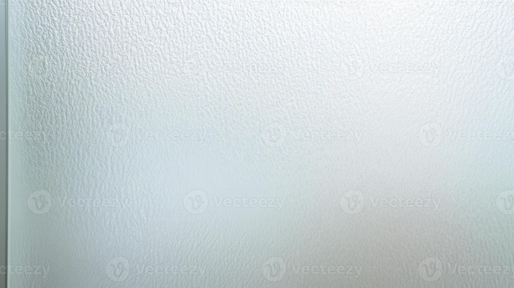 Textured glass surface with a soft, frosted appearance, providing privacy and diffusing light photo