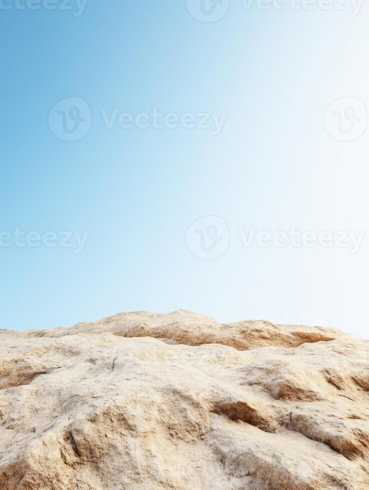 Textured terrain under a bright, clear sky. The scene evokes a sense of tranquility and exploration photo
