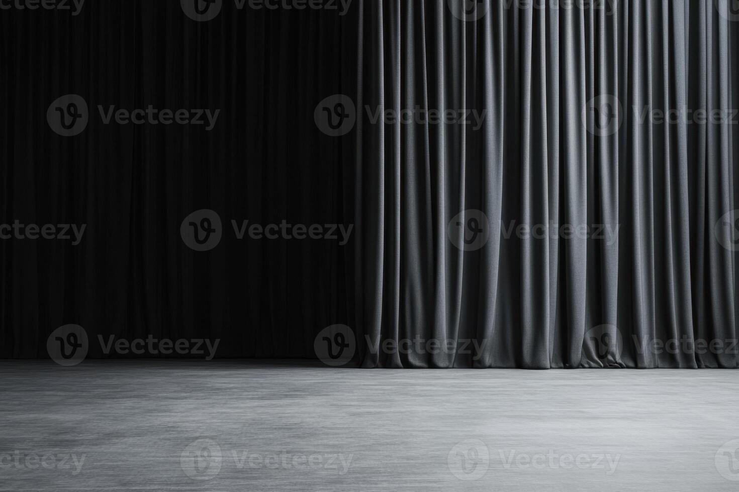 An empty interior space with dark curtains and a textured concrete floor creates a somber mood photo