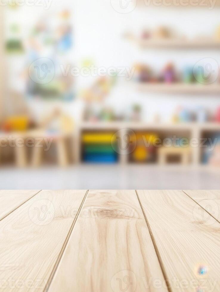 Light wood planks serve as a foreground for a blurred playroom, evoking a sense of warmth photo