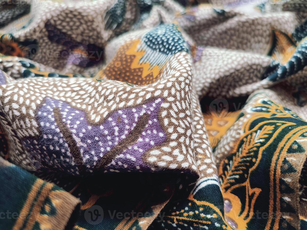 a close up of a colorful fabric with pattern photo