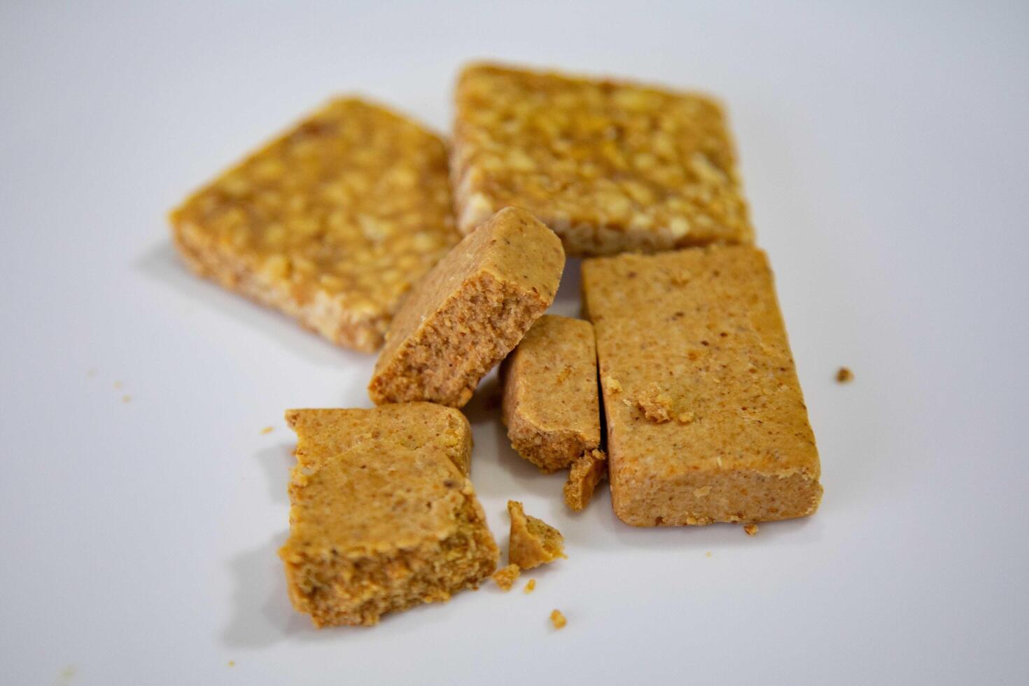 Pacoquinha is a sweet, crumbly Brazilian peanut candy made from ground peanuts and sugar, often enjoyed as a nostalgic snack 1 photo