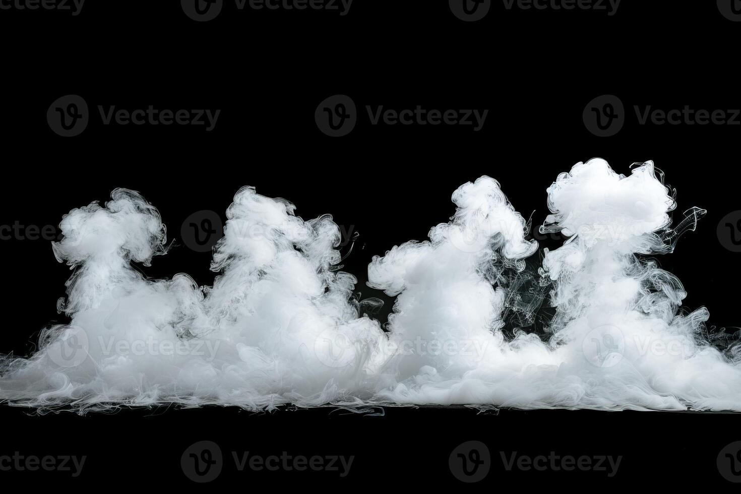 Delicate tendrils of white smoke dance and swirl on a dark backdrop, forming captivating shapes that evoke mystery and intrigue in the viewer's mind photo