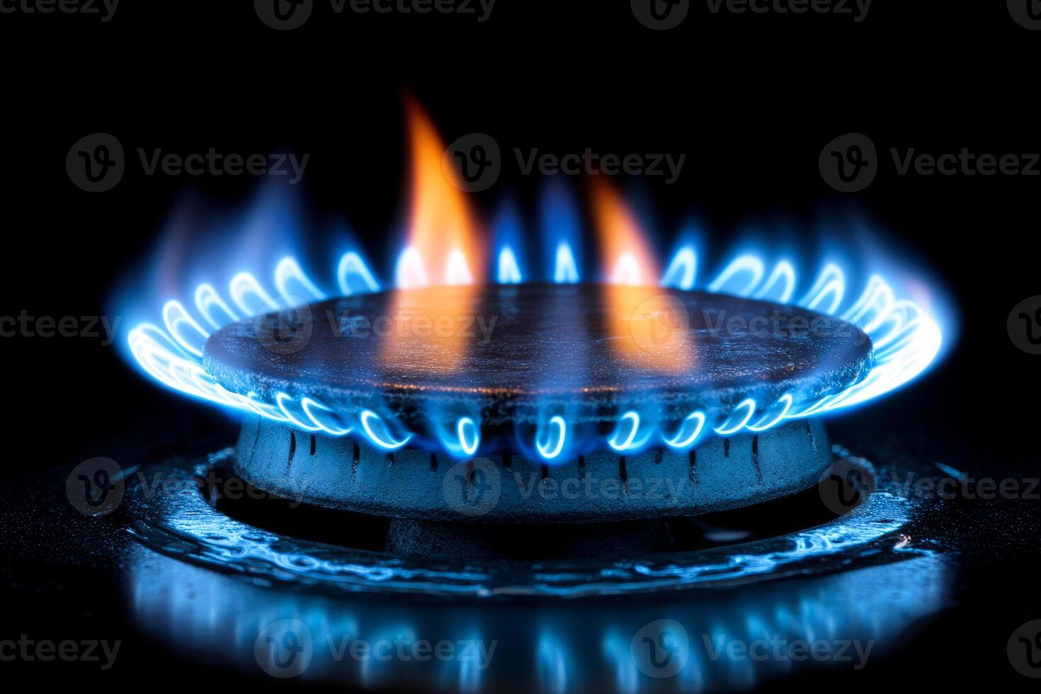 Blue gas flame burning on stove burner photo