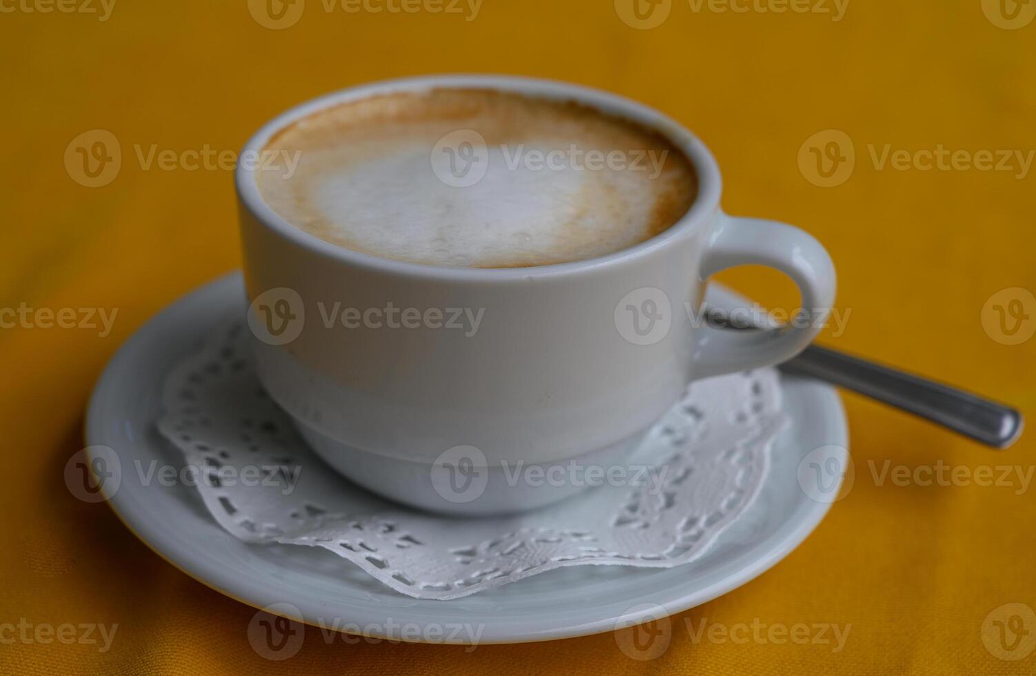 Discovering the comforting warmth of a perfectly brewed coffee on a sunny morning photo