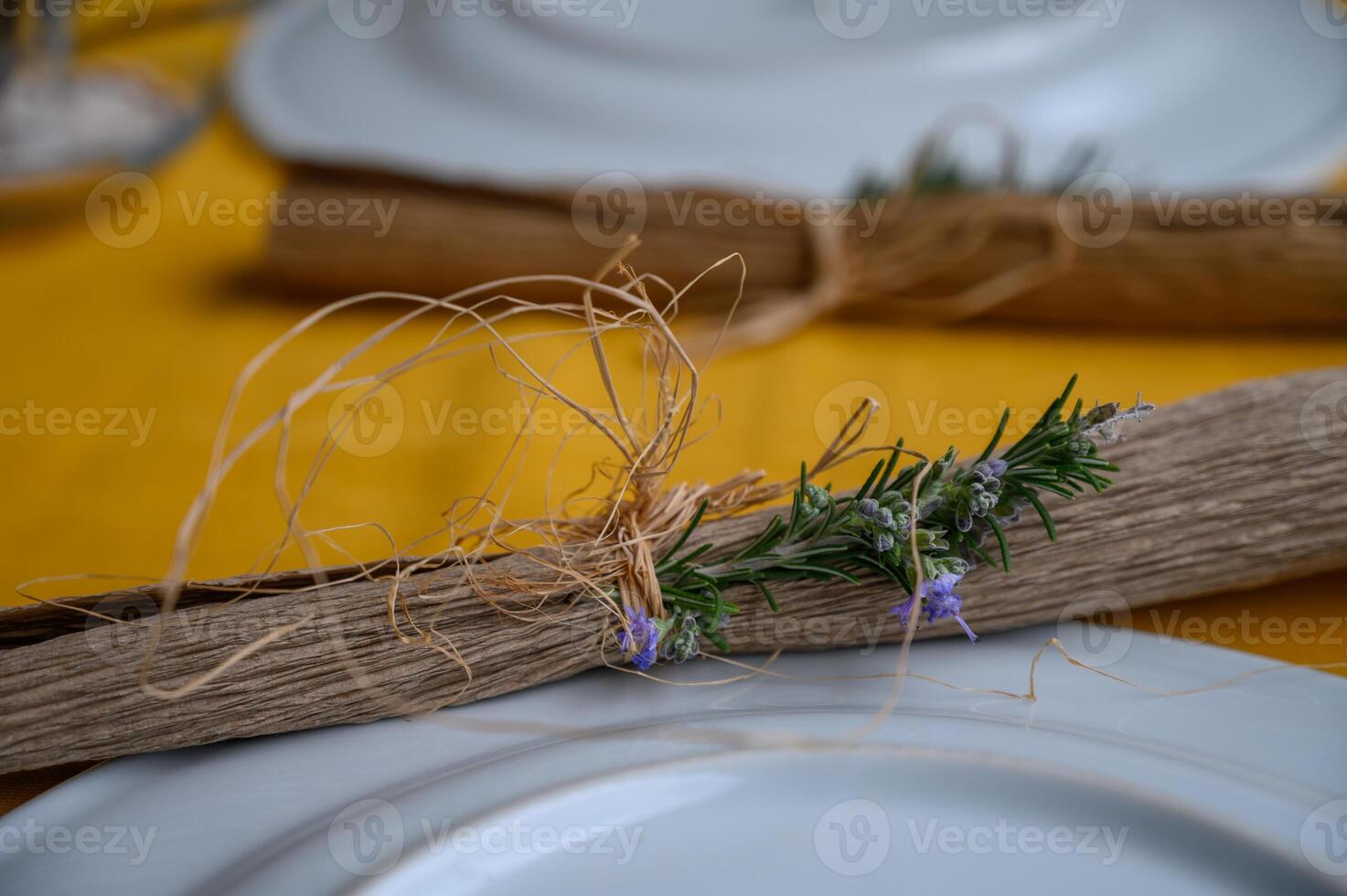 Elegant table setting adorned with natural elements and rustic charm for a delightful dining experience photo
