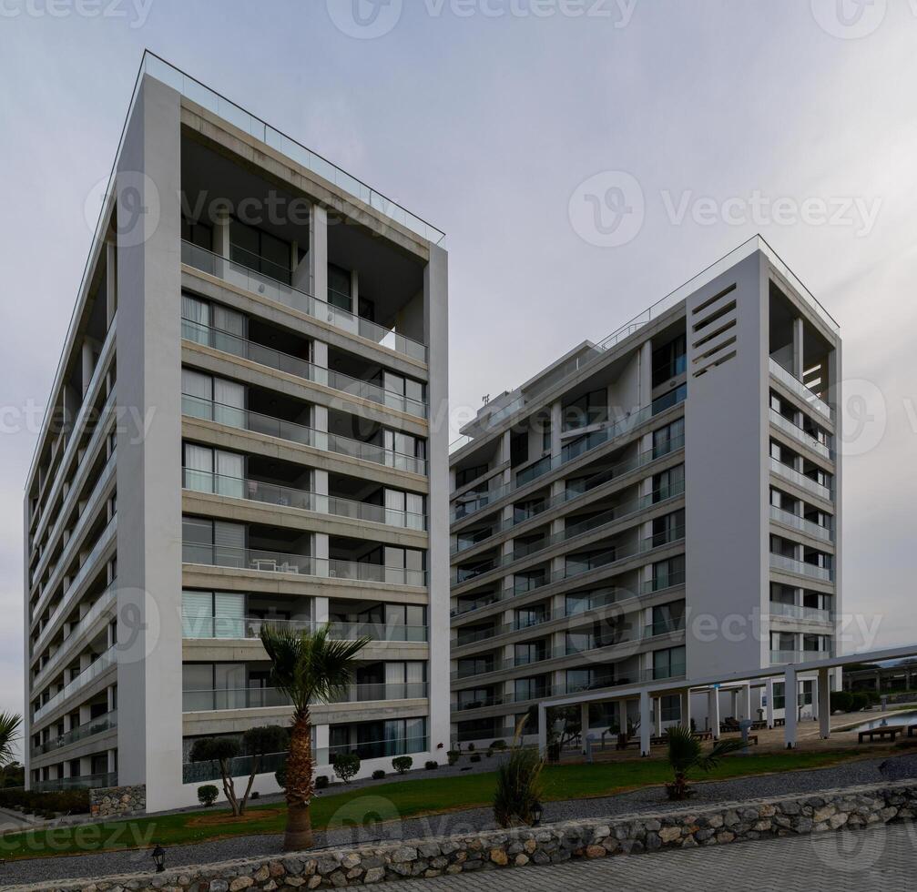 Modern architecture in a tranquil setting with striking minimalist design and lush landscaping photo