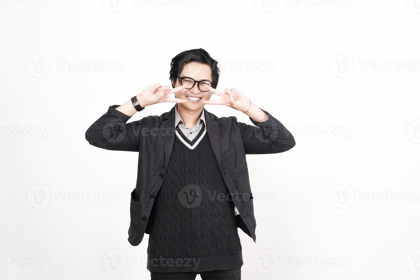 A man in glasses and a sweater is making a gesture photo