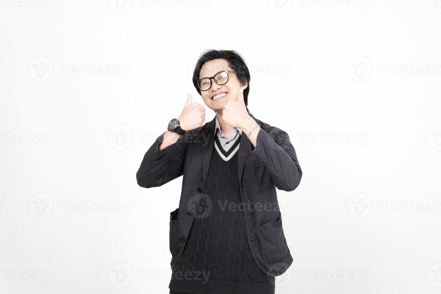 A man in a suit and tie making a thumbs up photo