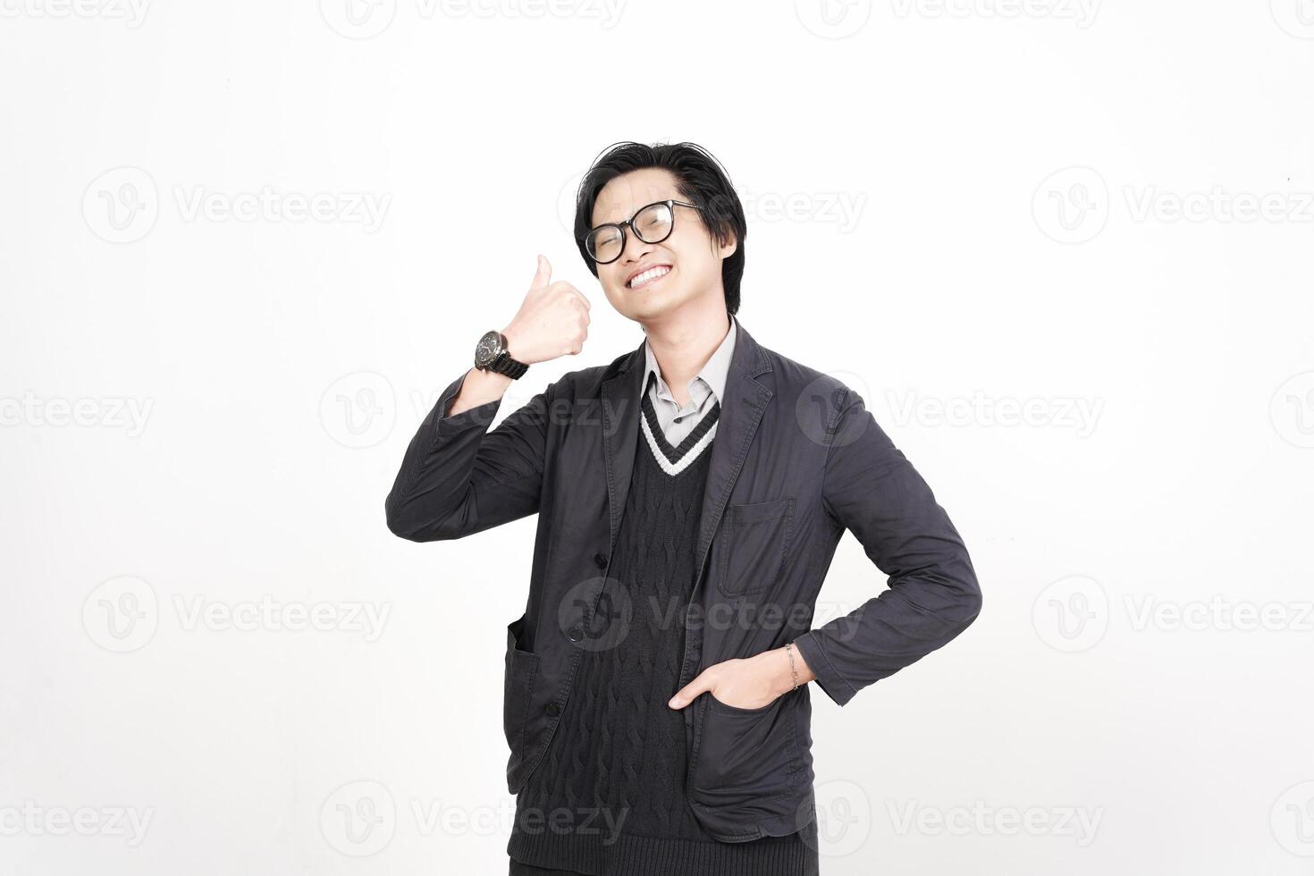 A man in glasses and a sweater is making a gesture photo