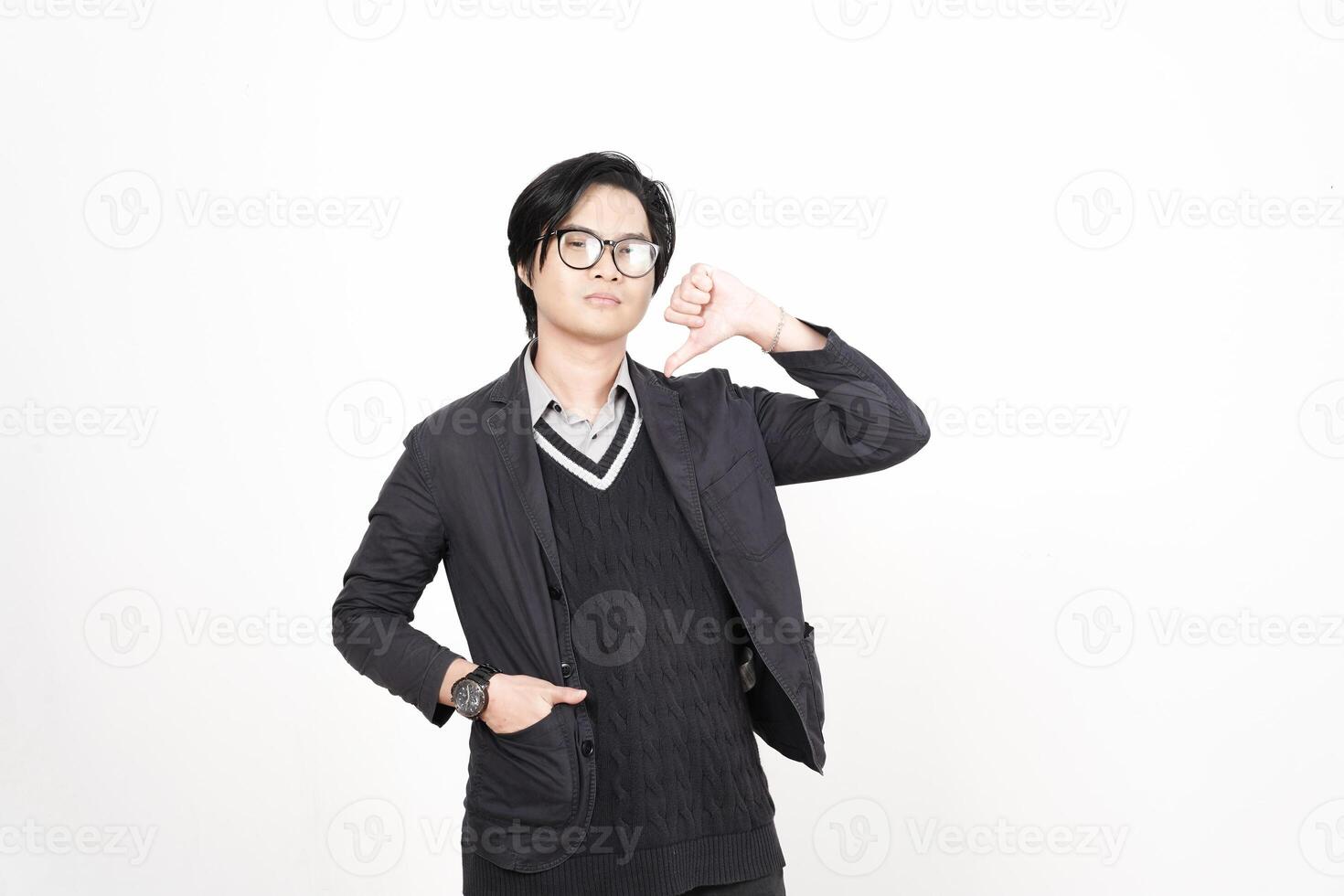 A man in glasses and a sweater is making a gesture photo