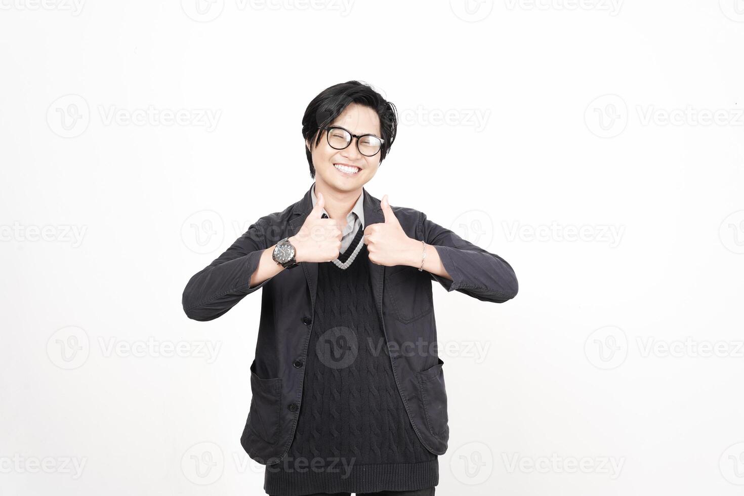 A man in glasses and a sweater is giving a thumbs up photo