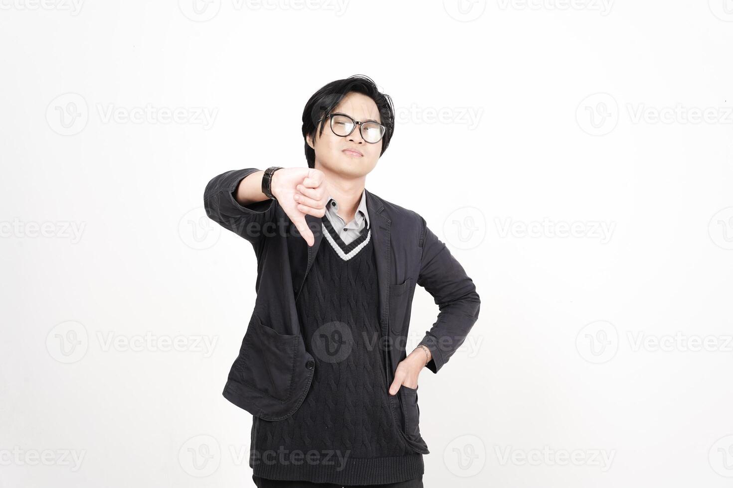 A man in glasses and a sweater pointing at something photo