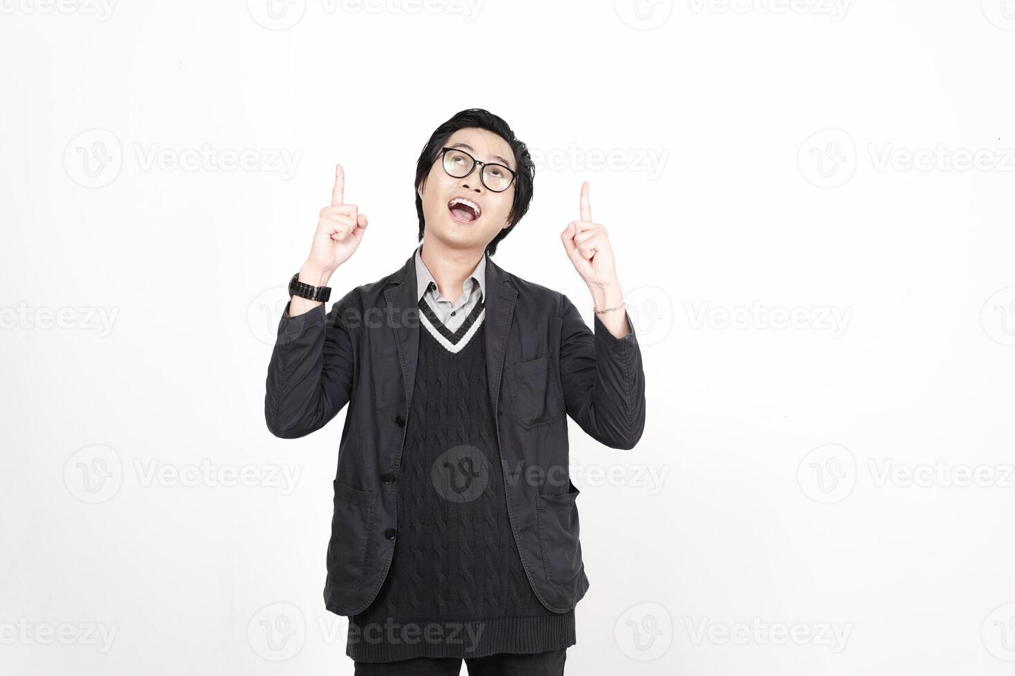 A man in glasses and a sweater is pointing his finger photo
