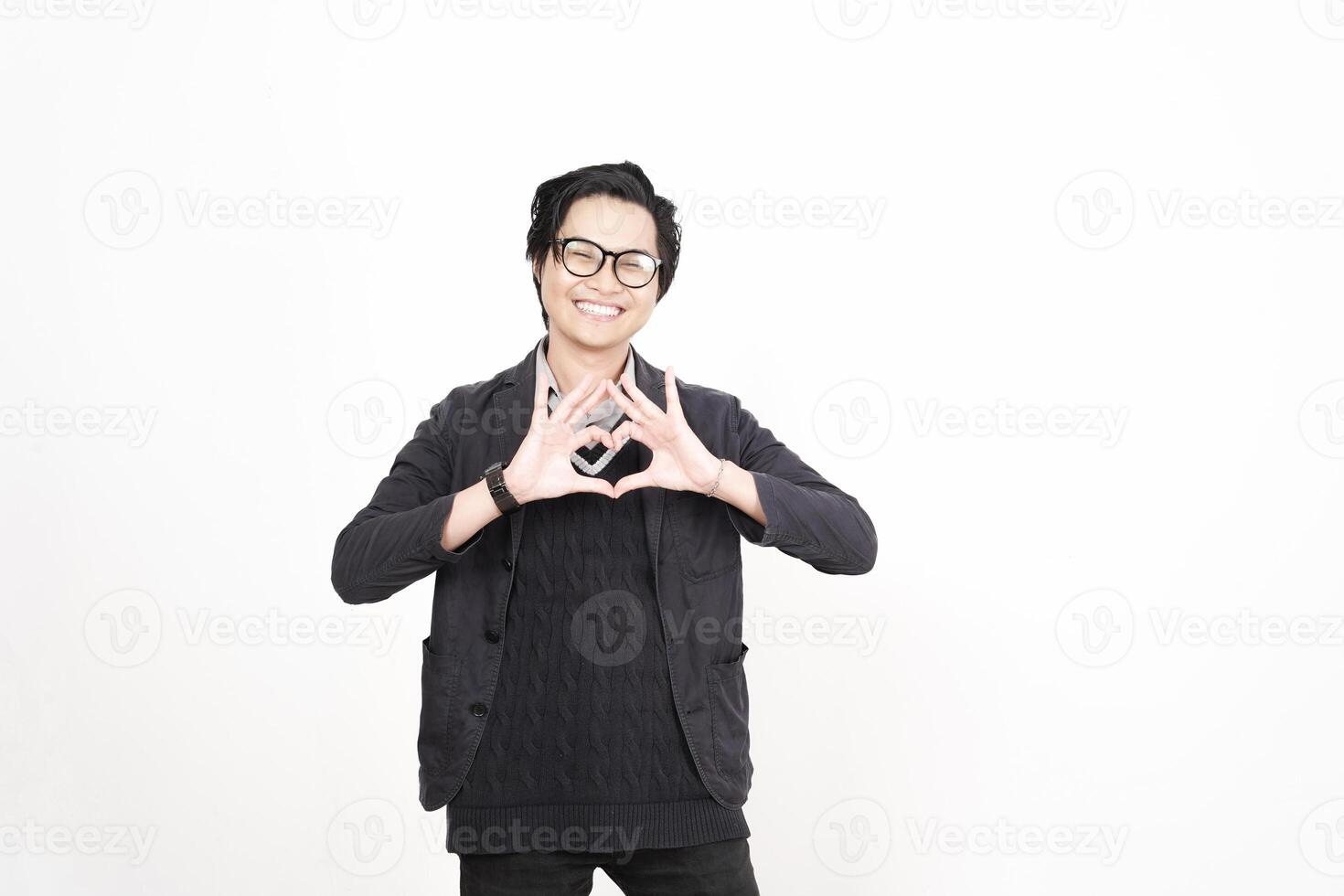 A man in glasses making a heart sign photo