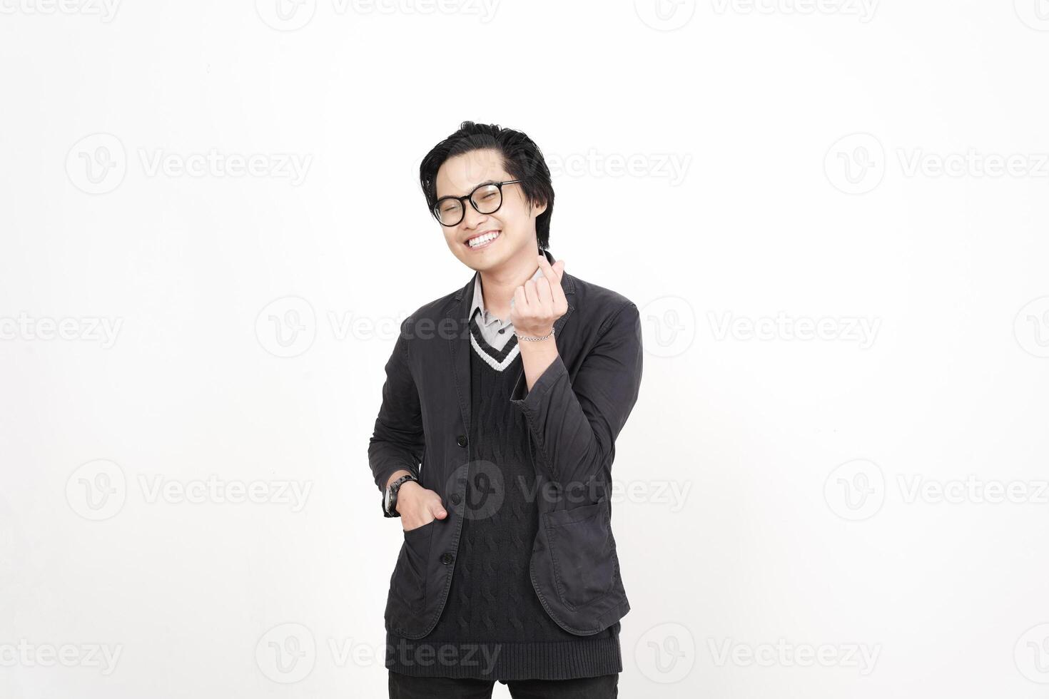 A man in glasses and a sweater is making a gesture photo