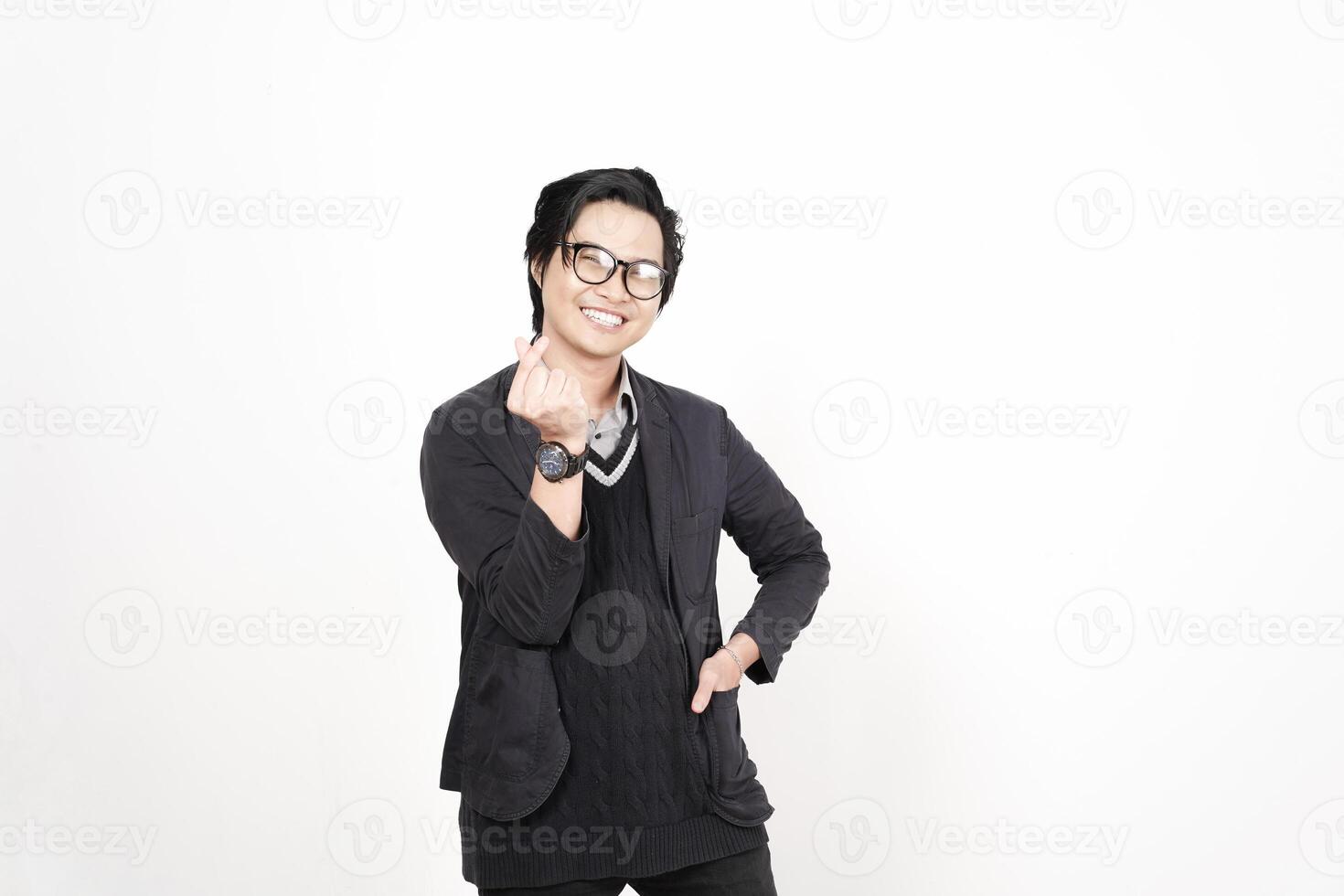 A man in glasses and a sweater is making a gesture photo