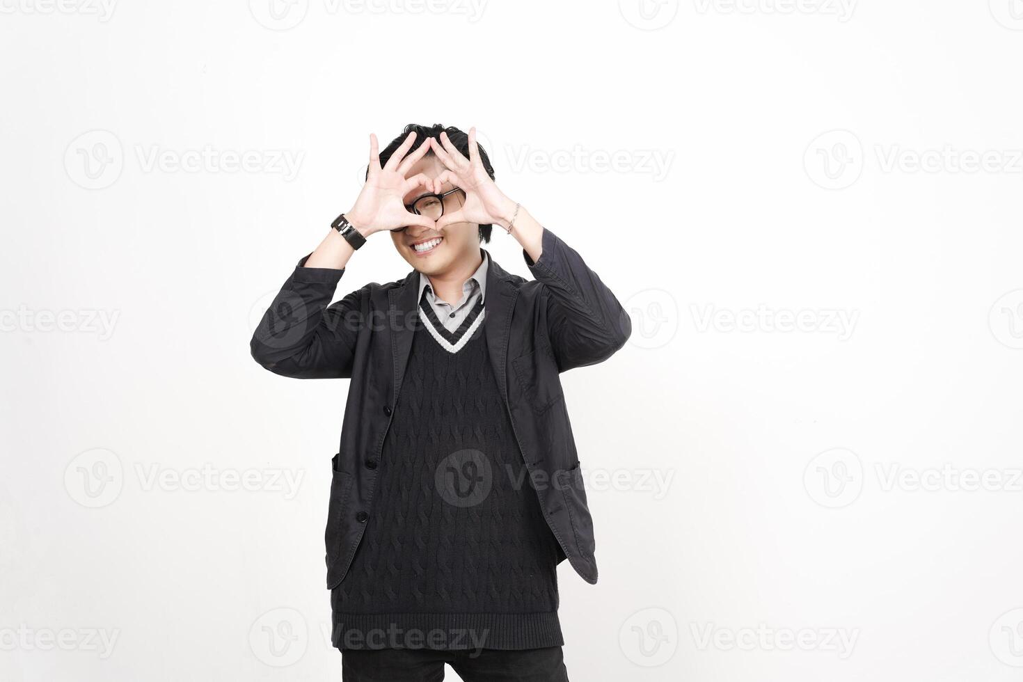 A man in a sweater and jacket is making a face photo