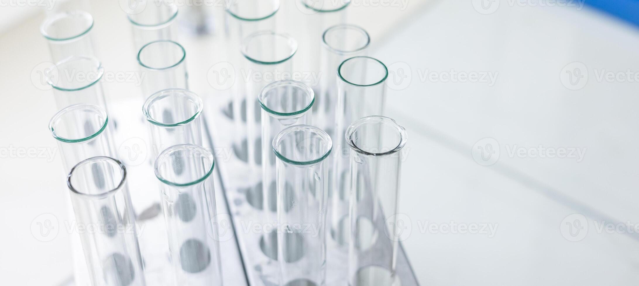 A row of glass tubes in a laboratory photo