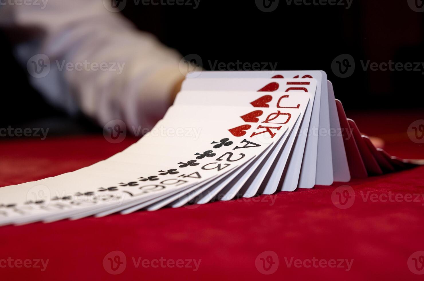 A person is holding a stack of cards photo