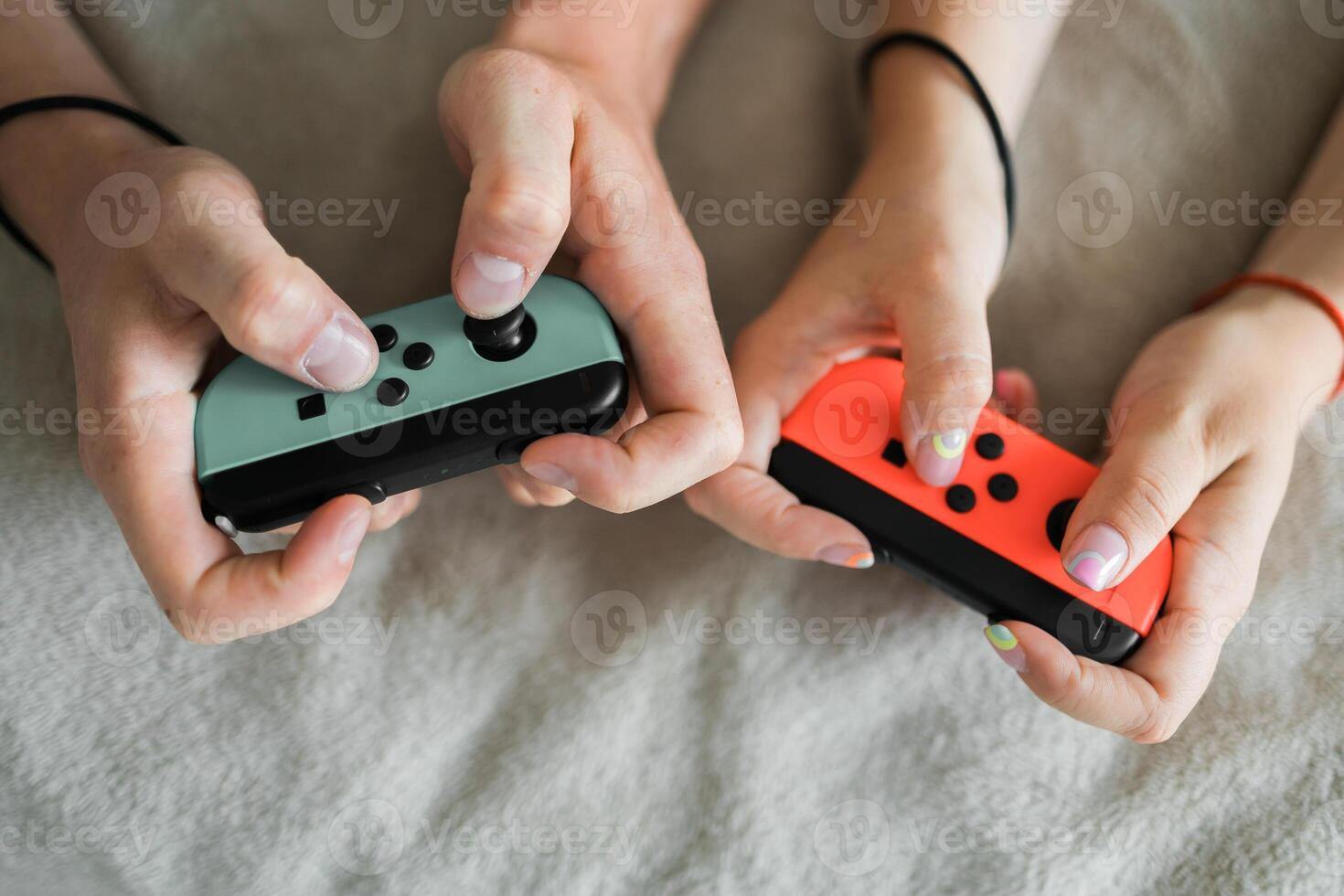 Hands using game controller. Playing games photo