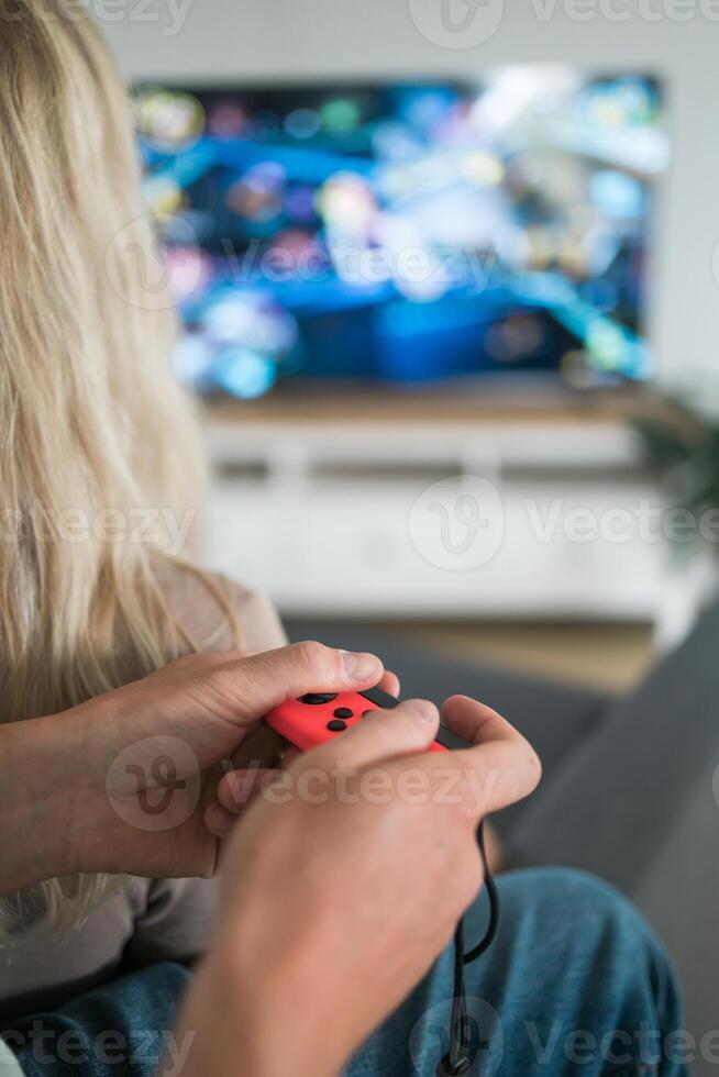 Hands using game controller. Playing games photo