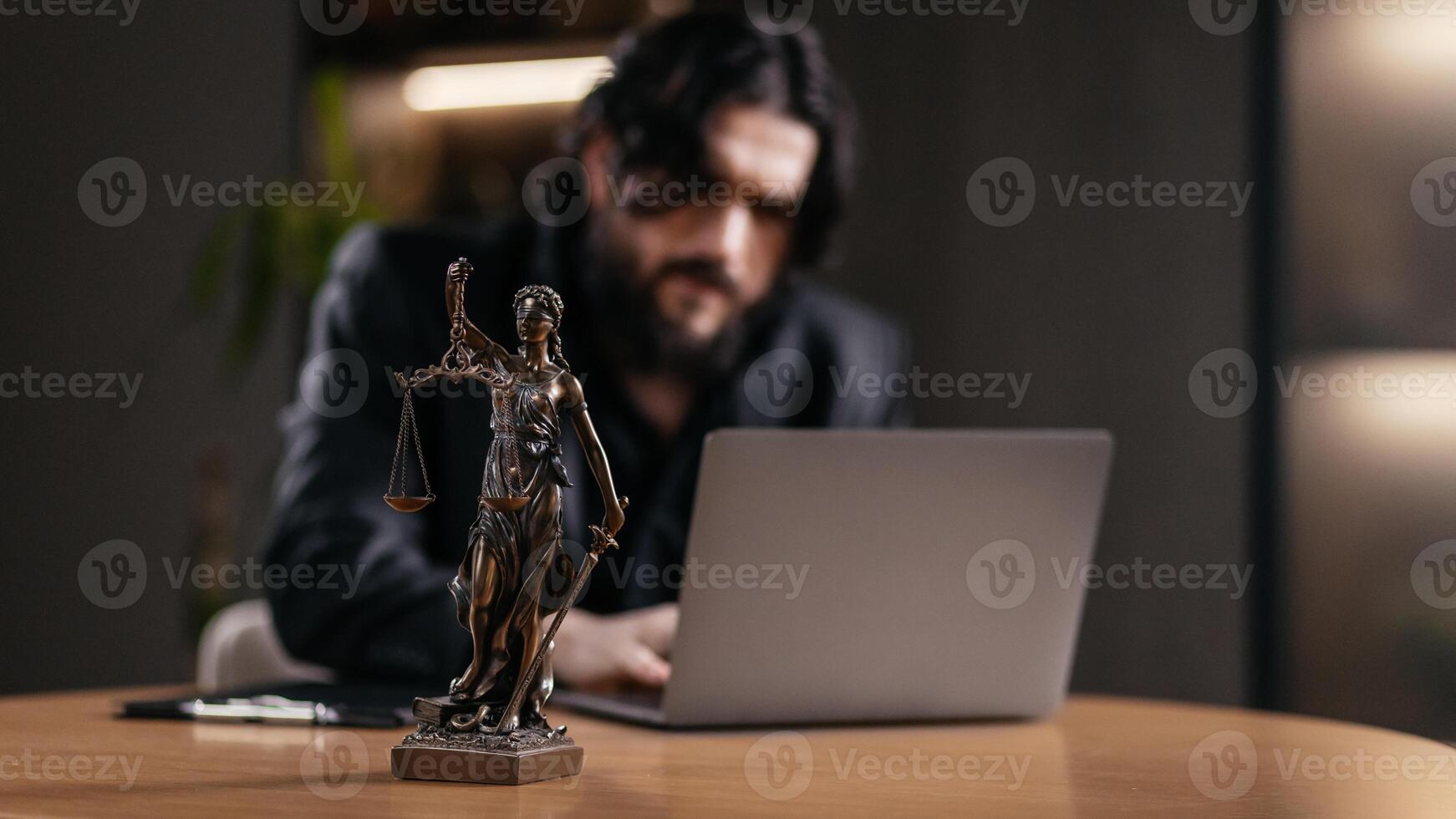 Mature businessman Lawyer working on laptop and checking financial business data, reading the statute of limitations and legal services firms at office. Law, advice and justice concept photo